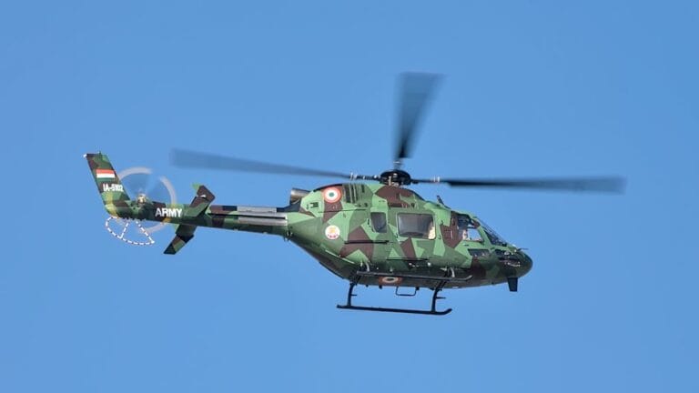 Indian Army helicopter flying at Aero India in Bengaluru.