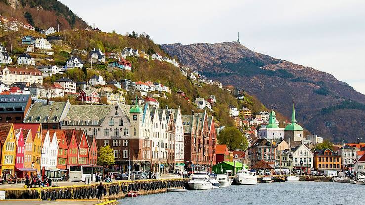 Modi Norway visit after 43 years Image of norway showing colorful homes and mountains