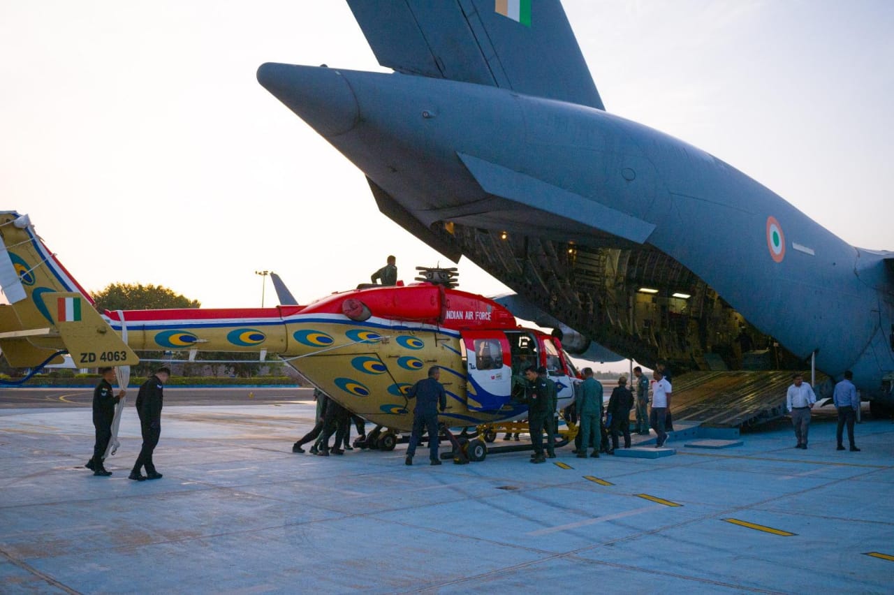 ALH Dhruv helicopter of Sarang team being unloaded from IAF C-17 Globemaster in Egypt