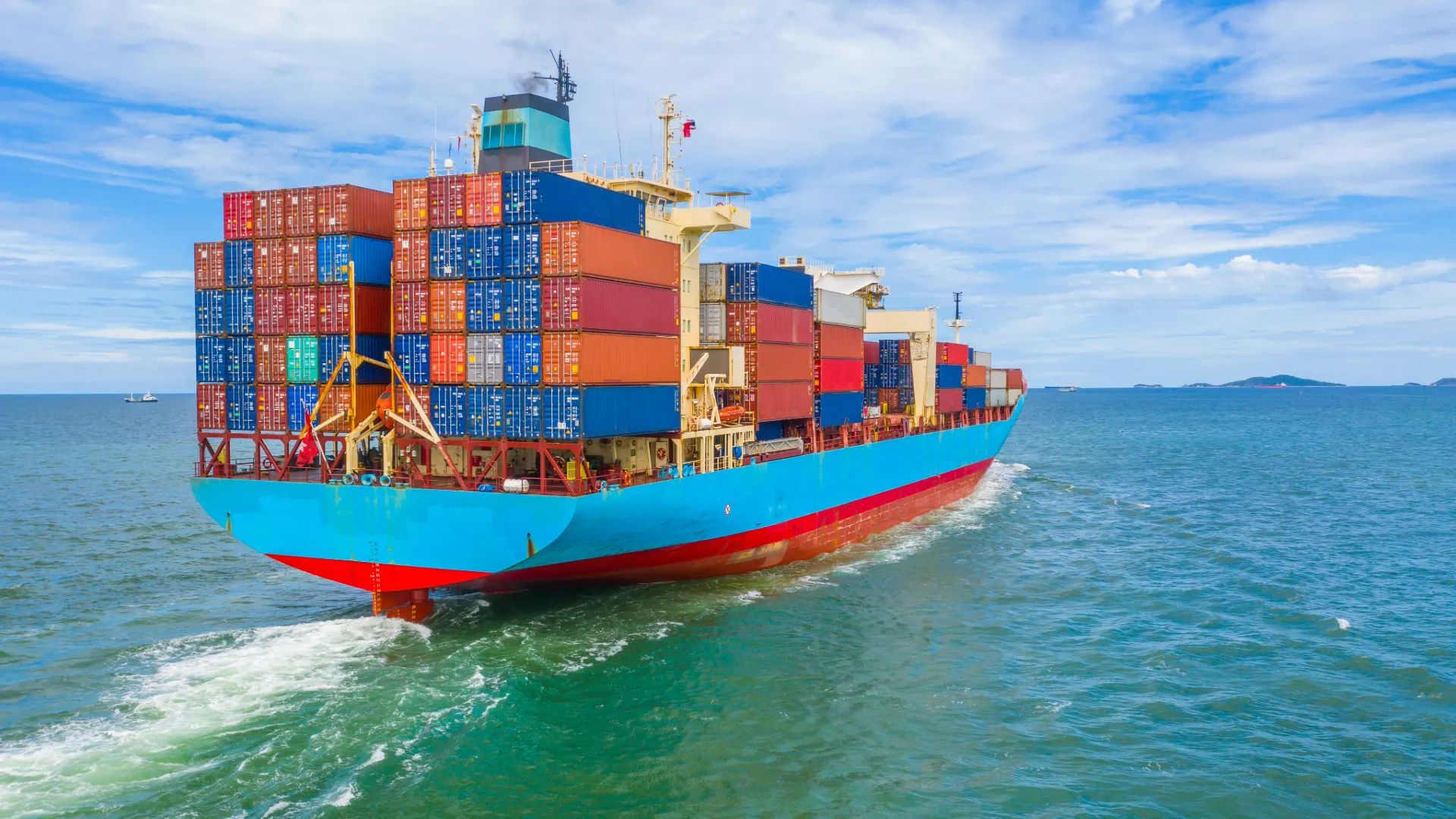 The Sulphur Shock: How a Refinery Waste Product Broke the Fertiliser Chain, and What It Costs India A cargo ship in ocean for illustration of Sulphur Shortage supply chain